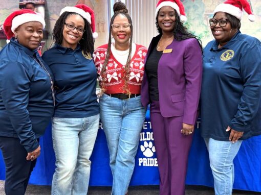 Chanae Clemons with staff at Church Street Elementary