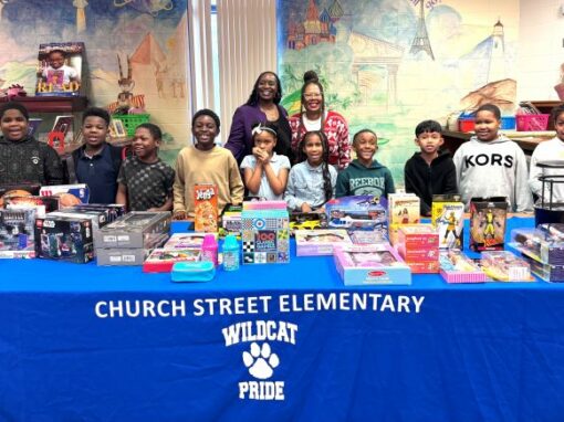 Students with Chanae Clemons and Principal Monica Goree