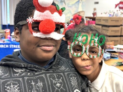 Boy and Girl with Christmas glasses